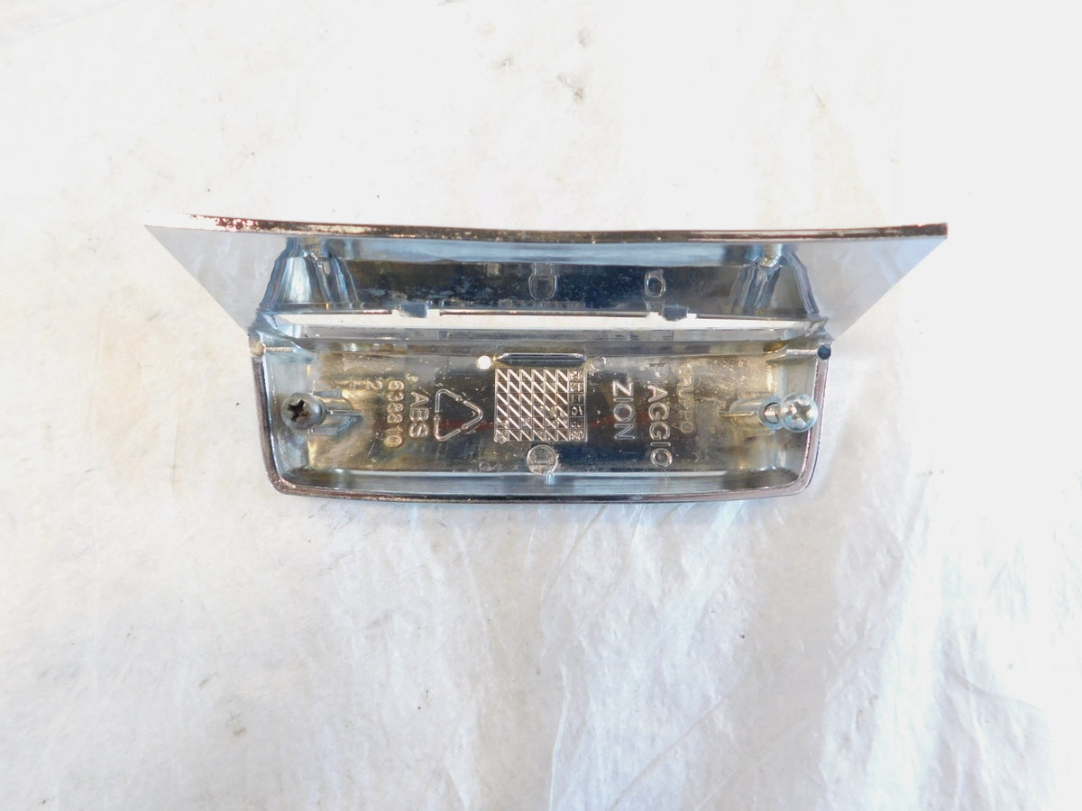 Piaggio Vespa LX LXV 50 125 150 Chrome Rear License Plate Light Cover w/ Lens - C3 Cycle