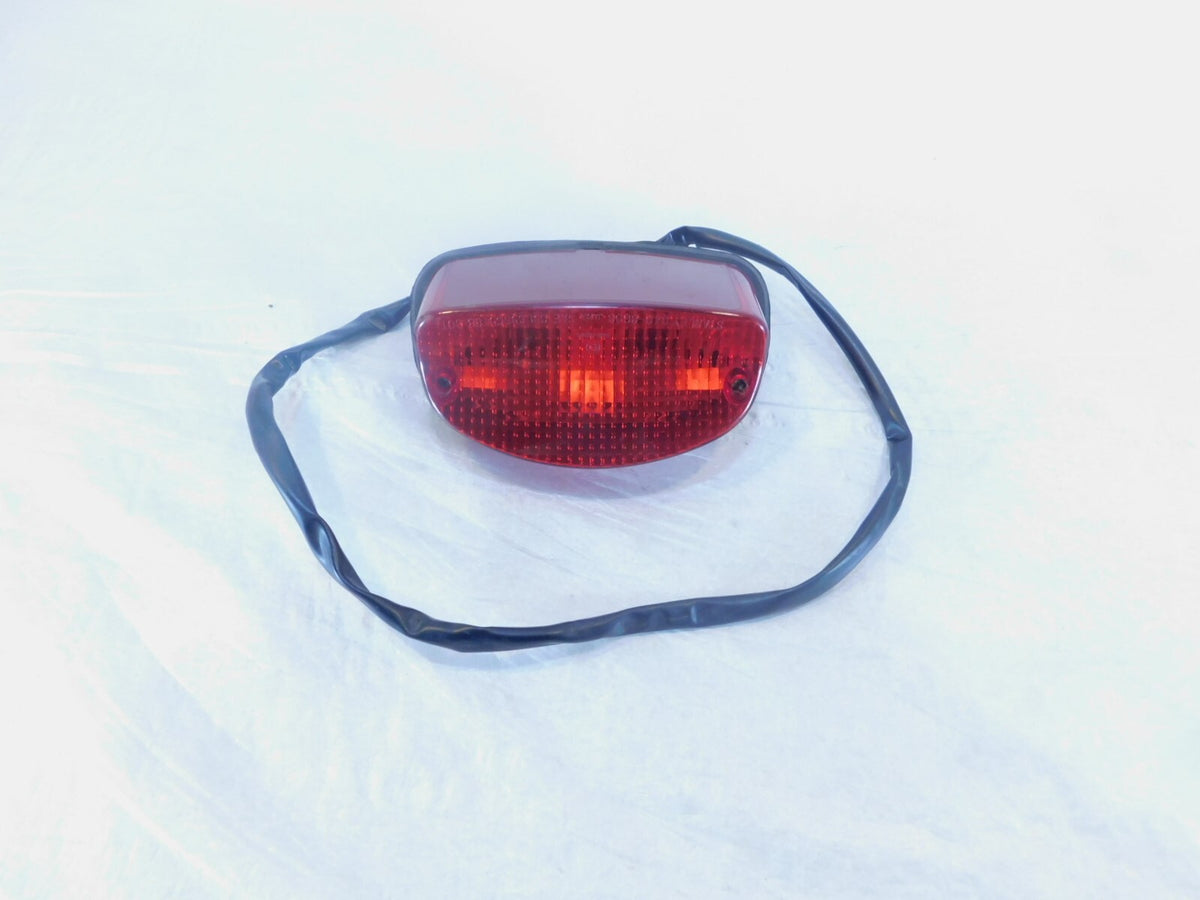 04-07 Honda VT600C VT600CD Shadow 600 Rear Tail Brake Light w/ Backplate & Lens - C3 Cycle