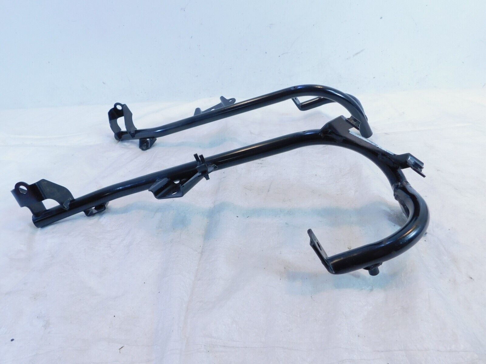 a  02 Honda FSC600 Silver Wing 600 Floor Mount Stay Brackets